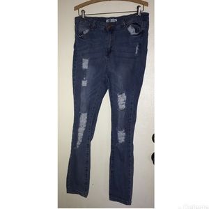 Distressed denim jeans